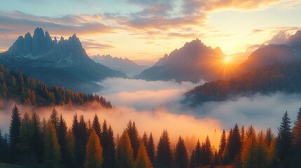 Obraz premium mountains in fog at beautiful sunset in autumn in dolomites italy landscape with alpine mountain valley low clouds trees on hills village in fog blue sky with clouds aerial view passo giau