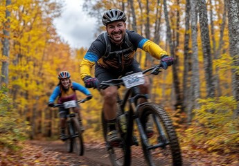 man and woman riding mountain bikes on an autumn forest trail