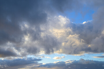 Obraz premium Sky with gray white clouds and blue sky horizontally during the day