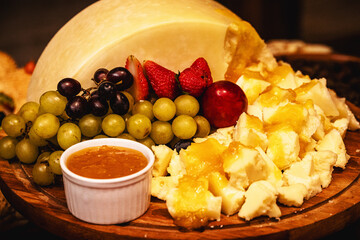 Parmesan cheese, with cream honey and fruits, Brazilian appetizers