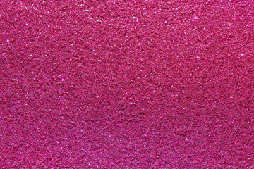 A pink background with a lot of glitter