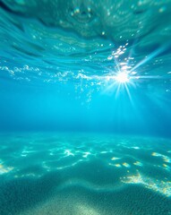 Obraz premium Tranquil Underwater Scene with Sunlight Glimmers in Crystal Clear Ocean