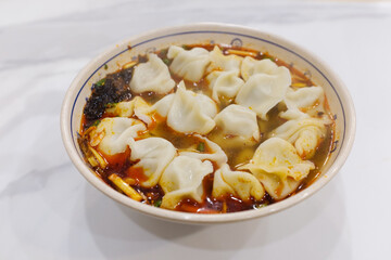 Spicy and delicious hot and sour soup dumplings