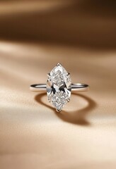 Brilliant Marquise Diamond Engagement Ring on Beige Silk