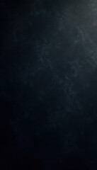 Fototapeta premium Deep black backdrop featuring heavy grain and uneven shading, overlay, dark backdrop