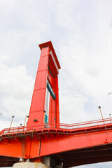 The red Ampera Bridge in Palembang City, South Sumatra, over the Musi River