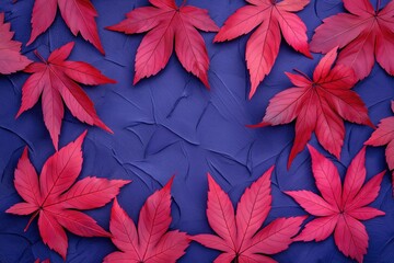Red Maple Leaves on Textured Dark Blue Background