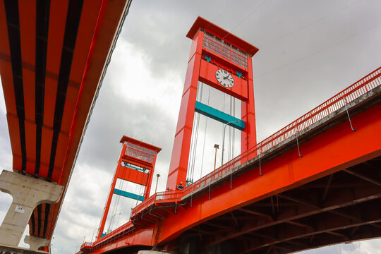 The red Ampera Bridge in Palembang City, South Sumatra, over the Musi River