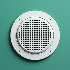 White Round Speaker Grill on Teal Wall Architectural Detail