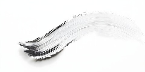 A smooth, abstract brushstroke in black and white on a clean background.
