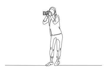 Photographer holding camera in continuous one line drawing. Single line art illustration of woman hold camera. Hobby and photographer's day concept. Editable vector.
