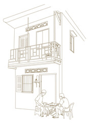 2 mans playing games front of old house