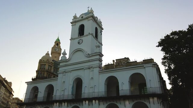 Cabildo iconic building of Buenos Aires City Argentina over sunset skyline historic architecture illuminated at dusk