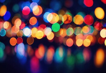 Fototapeta premium Christmas lights bokeh, abstract bokeh of festive lights with orange, blue and red blurred light circles on a black background