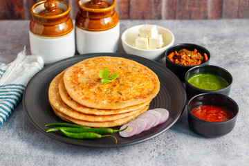 Paneer ka paratha is a soft, flavorful Indian flatbread stuffed with spiced cottage cheese, served hot with chutney or yogurt.