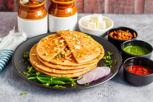 Paneer ka paratha is a soft, flavorful Indian flatbread stuffed with spiced cottage cheese, served hot with chutney or yogurt.