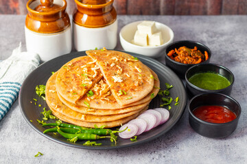 Paneer ka paratha is a soft, stuffed Indian flatbread filled with spiced cottage cheese, perfect for breakfast or lunch.
