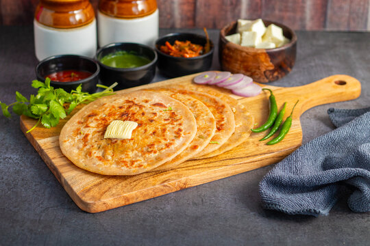 Paneer ka paratha is a traditional Indian flatbread stuffed with spiced paneer, offering a delicious, savory, and satisfying meal.