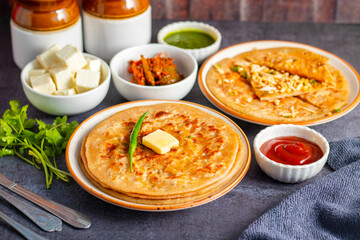 Paneer ka paratha is a soft, flavorful Indian flatbread stuffed with spiced cottage cheese, served hot with chutney or yogurt.
