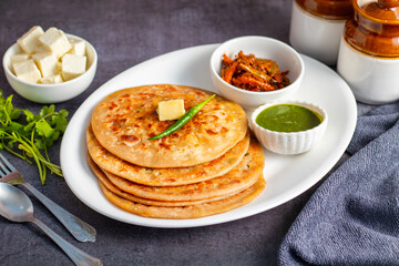 Paneer ka paratha is a soft, stuffed Indian flatbread filled with spiced cottage cheese, perfect for breakfast or lunch.