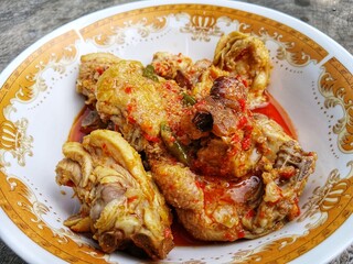 Ayam Woku, a typical chicken dish from Manado, North Sulawesi, Indonesia. Which has a rich aroma and a spicy taste

