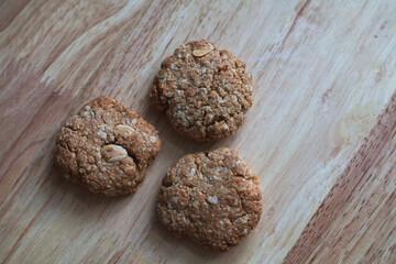 Healthy crispy oat cookies on a wooden background, Healthy food for diet lifestyle