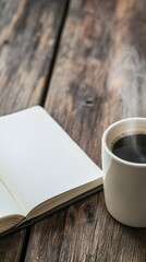 A steaming cup of coffee beside an open notebook on a rustic wooden table.