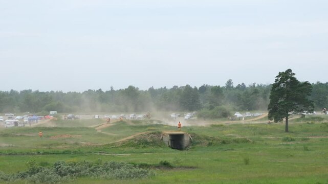 Motorcycle racing. Motorcyclists overcome jumps. Enduro Motorcycle Race. Sport