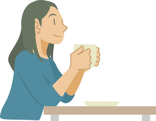 ホットドリンクを飲む女性