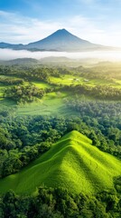 Obraz premium Breathtaking Aerial View of Lush Green Landscape With Mountain Peak in the Background Under Bright Blue Sky and Soft White Clouds at Sunrise or Sunset