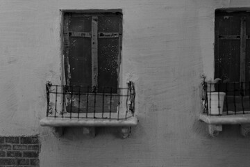 Monochrome Photo of Miniature Building Windows and Balconies