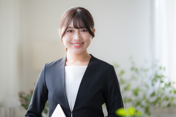 Young businesswoman with laptop in office Image camera eye view of personnel, hiring, etc.