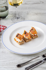 Red mullet with mash sauce on slices of bread in fine dining restaurant