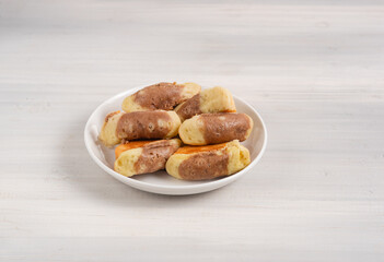 Kue Pukis, is an Indonesian traditional cake. Pukis is made of a wheat flour-based batter and cooked in a special mold pan similar to muffin tin.