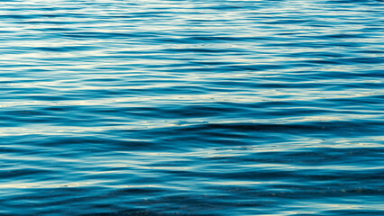 Blue water surface and small ripples