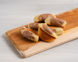 Kue Pukis, is an Indonesian traditional cake. Pukis is made of a wheat flour-based batter and cooked in a special mold pan similar to muffin tin.