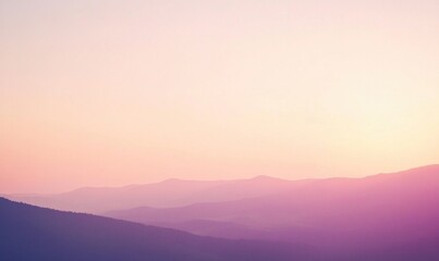 Fototapeta premium Gently rolling mountains blend into soft gradients as twilight envelops the serene landscape, creating a tranquil atmosphere