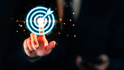 Targeting business concept. Businessman pionting virtual target icons for business objective. Strategic planning for business growth and target customer group.
