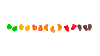 Fruit flavored worm shape, jelly candies. Isolated on transparent background.