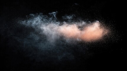 Fototapeta premium A swirling cloud of colorful powder against a dark background, creating a dynamic visual effect.