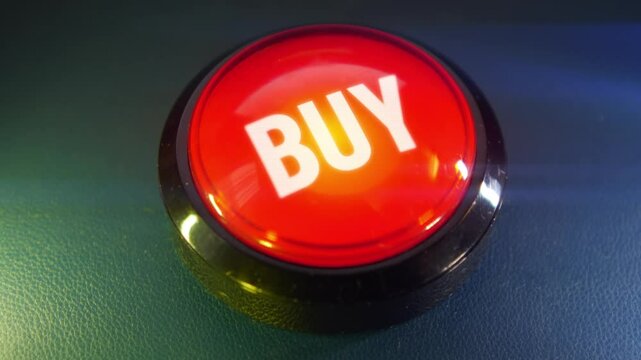 Pressing the big red button labeled with the message "Buy"
