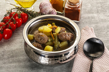 Soup with meatball and potato