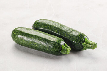 Raw green ripe zucchini vegetable