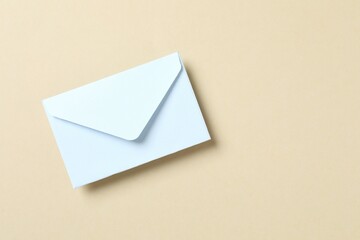 Paper envelope on color background