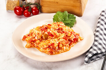 Shakshuka with tomato for breakfast