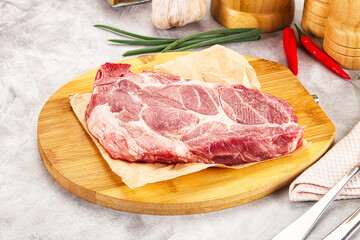 Raw pork neck steak for grill