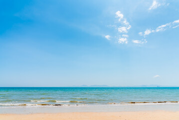 Tropical sea beach in clear blue sky sunny day summer holiday vacation.