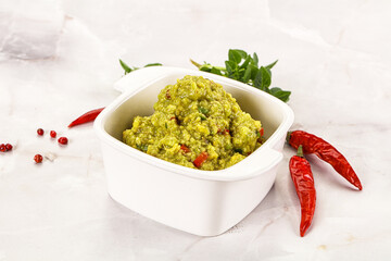 Guacamole with avocado, tomato and chili