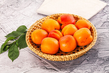 Raw ripe sweet apricots heap