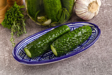 Homemade lighty salted cucumbers with herbs
